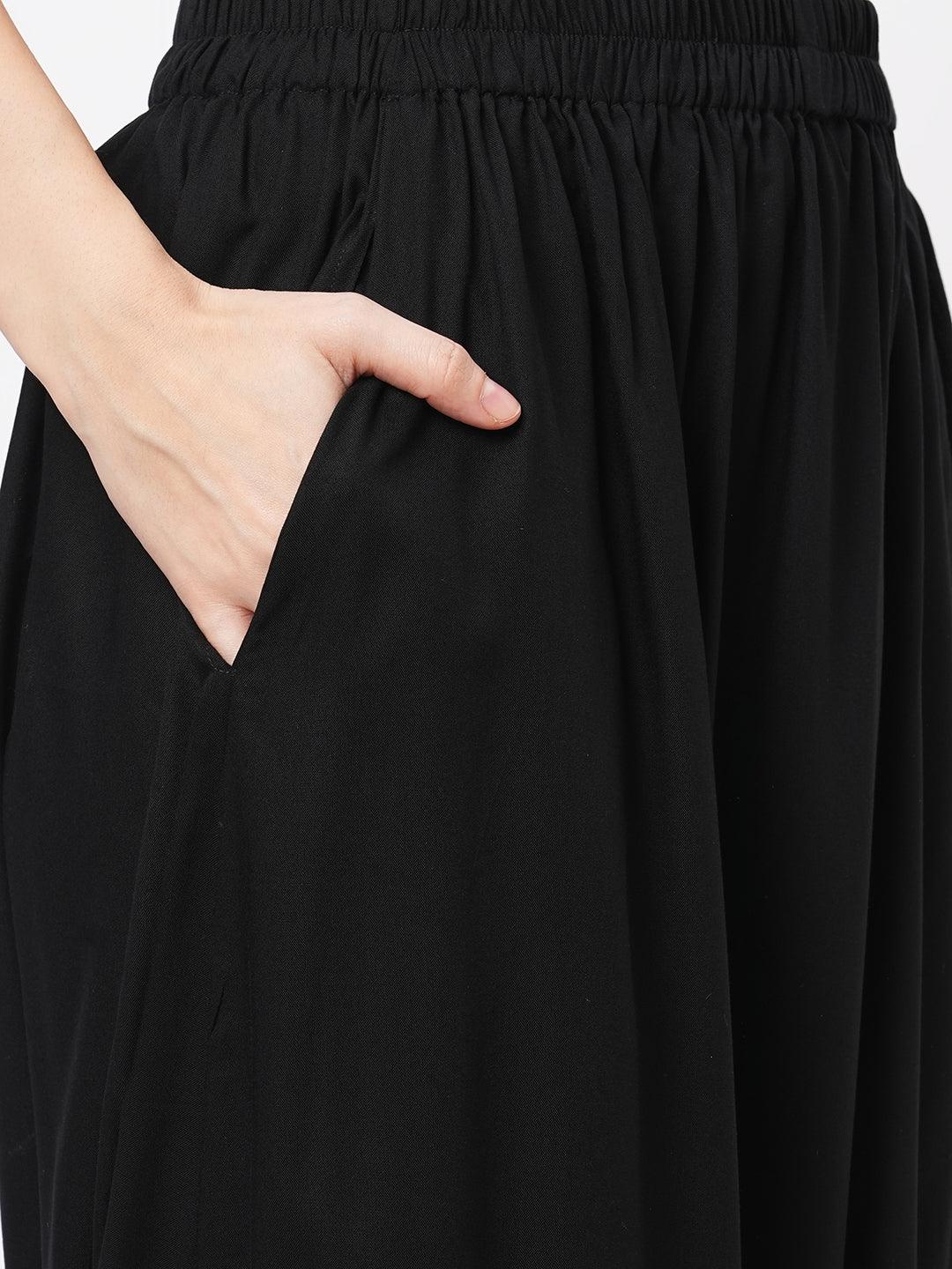 Hashtag Be Featuring a black kaftan set with dhoti pant