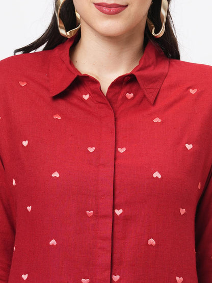 Hashtag Be Summery red calf length dress with collar and concealed placket and embroidery on the front.