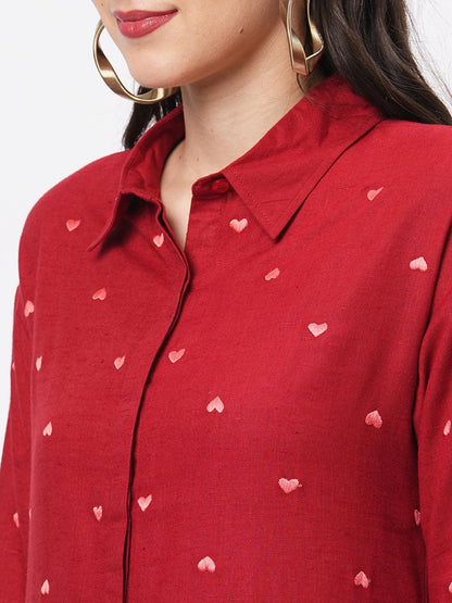 Hashtag Be Summery red calf length dress with collar and concealed placket and embroidery on the front.