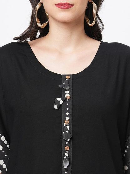Hashtag Be Featuring a black kaftan set with dhoti pant