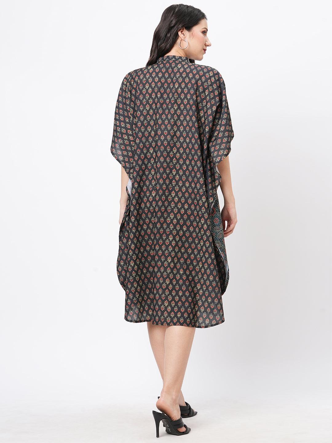 Hashtag Be featuring an green kaftan in two prints complimenting each other with front button placket