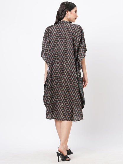 Hashtag Be featuring an green kaftan in two prints complimenting each other with front button placket