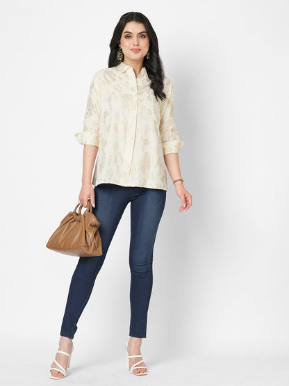 Featuring a foliage gold print confort fit shirt with drop shoulder that moves from Nine to wine