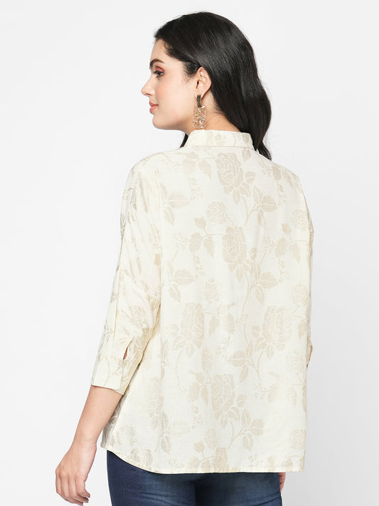 Featuring a foliage gold print confort fit shirt with drop shoulder that moves from Nine to wine