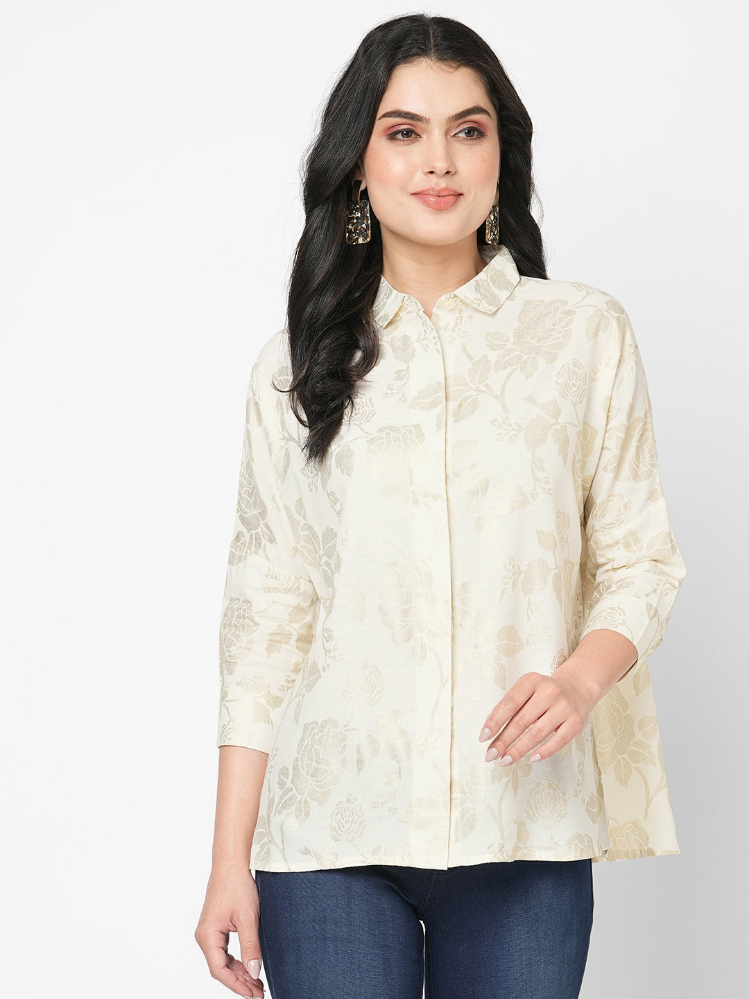 Featuring a foliage gold print confort fit shirt with drop shoulder that moves from Nine to wine