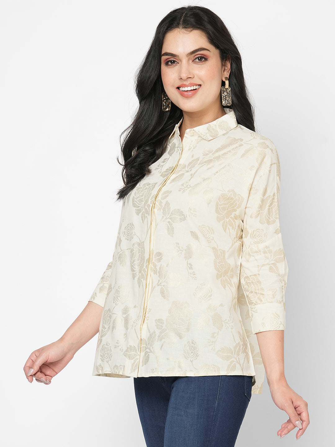 Featuring a foliage gold print confort fit shirt with drop shoulder that moves from Nine to wine