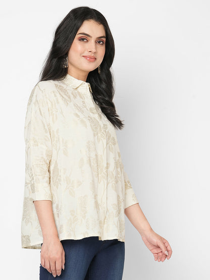 Featuring a foliage gold print confort fit shirt with drop shoulder that moves from Nine to wine