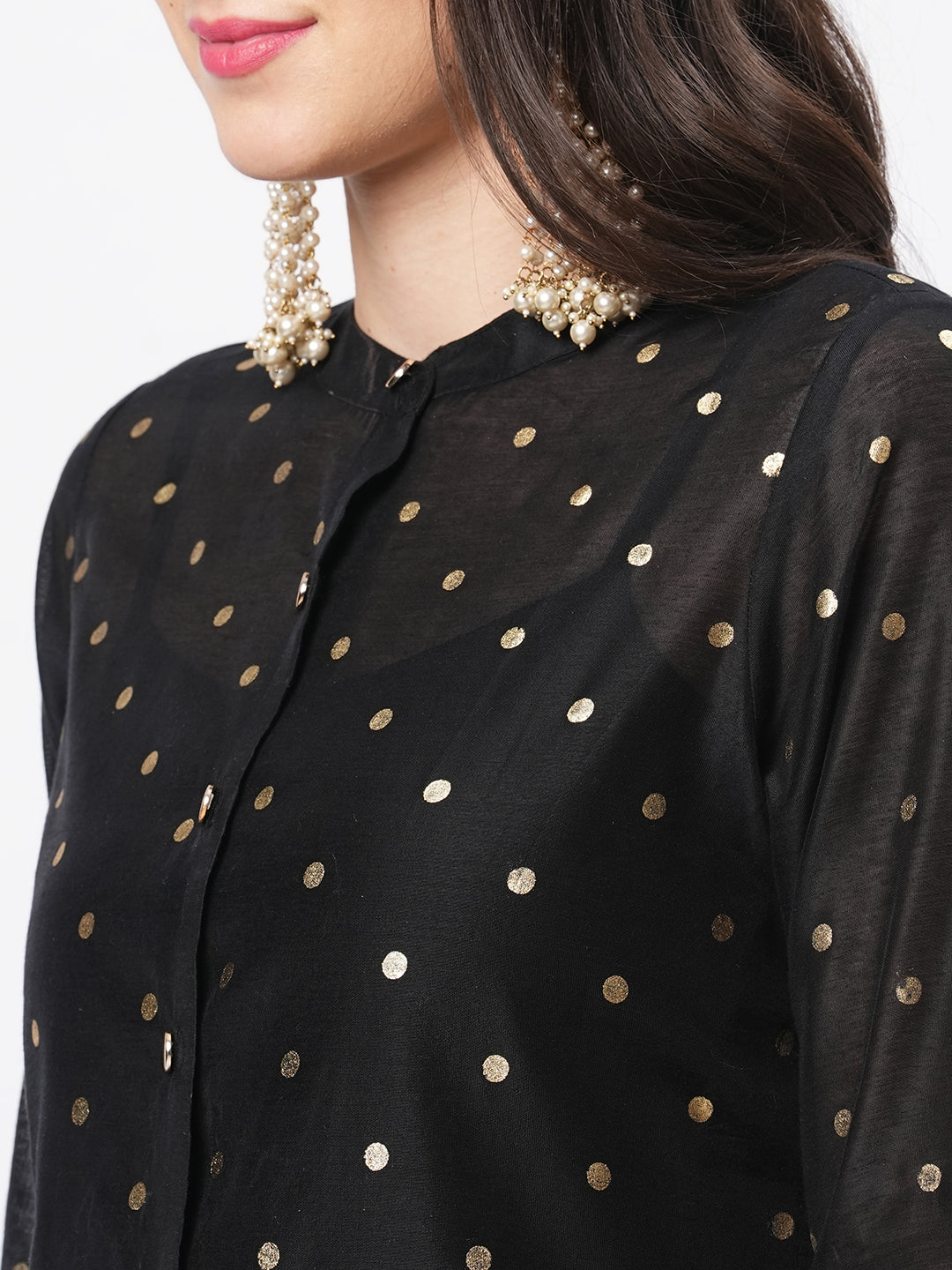 Hashtag Be Gold polka dotted black chanderi kurta with a cotton inner  and roll up sleeves.