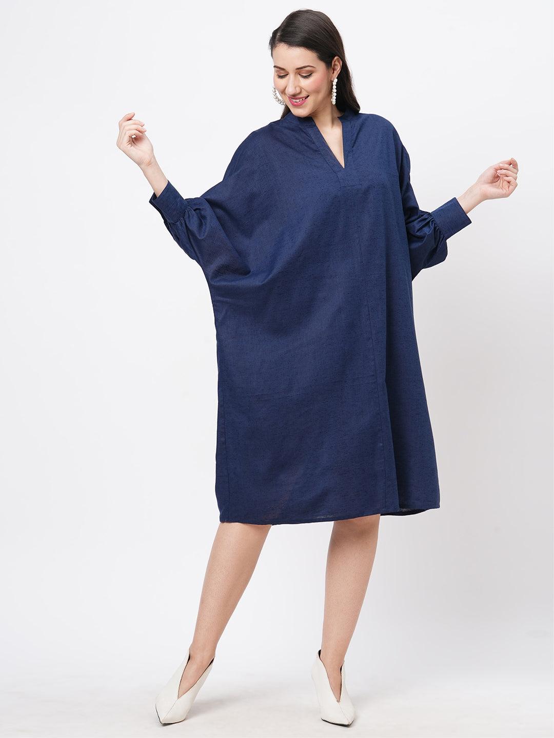 Hashtag Be Featuring a wide relaxed fit kaftan sleeve knee length dress in solid blue