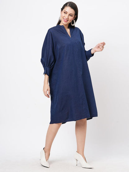 Hashtag Be Featuring a wide relaxed fit kaftan sleeve knee length dress in solid blue