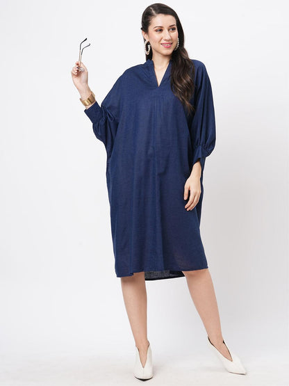 Hashtag Be Featuring a wide relaxed fit kaftan sleeve knee length dress in solid blue