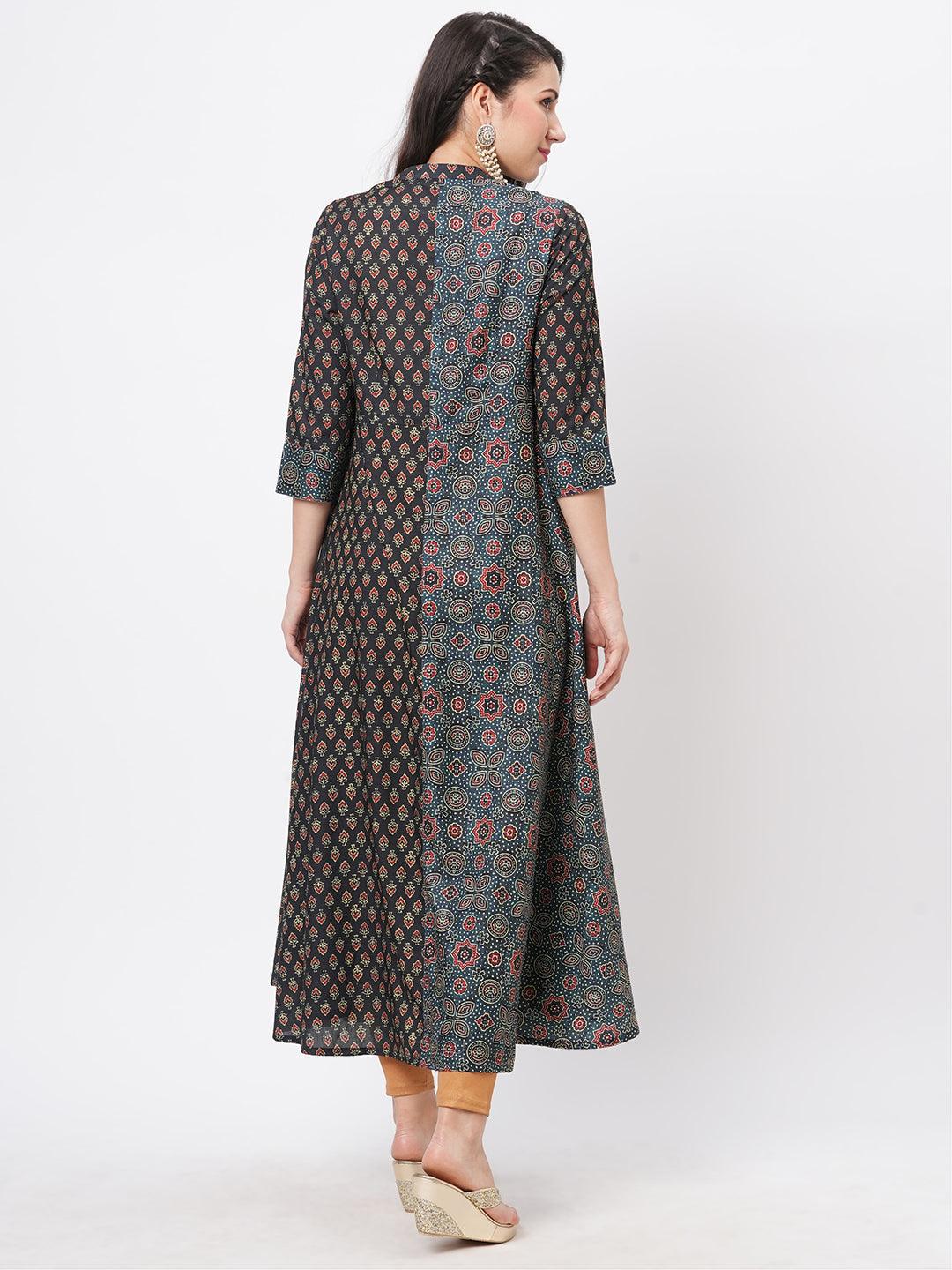 Hashtag Be forest green two print long flared kurta complimenting each other with contrast color tassel at the neck.