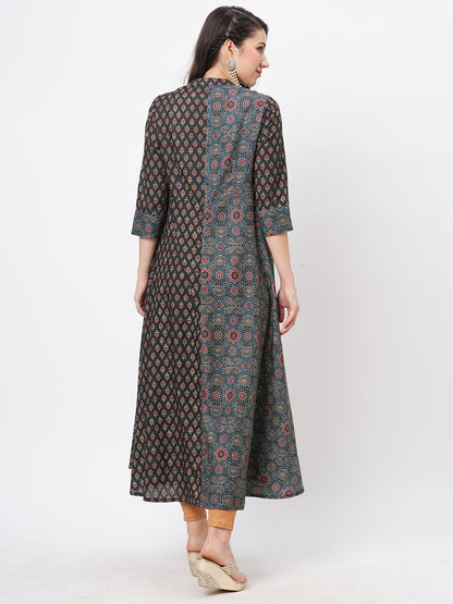 Hashtag Be forest green two print long flared kurta complimenting each other with contrast color tassel at the neck.