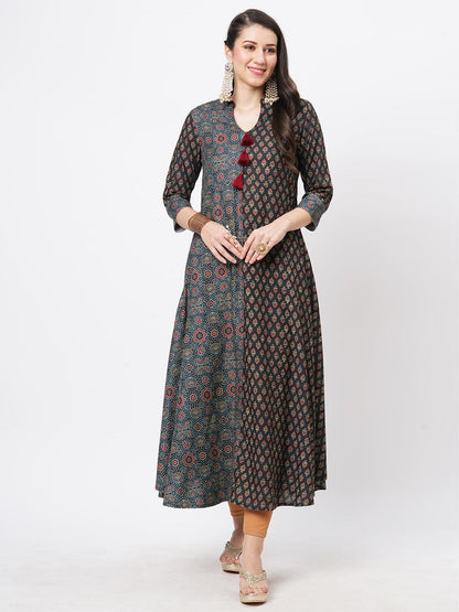 Hashtag Be forest green two print long flared kurta complimenting each other with contrast color tassel at the neck.