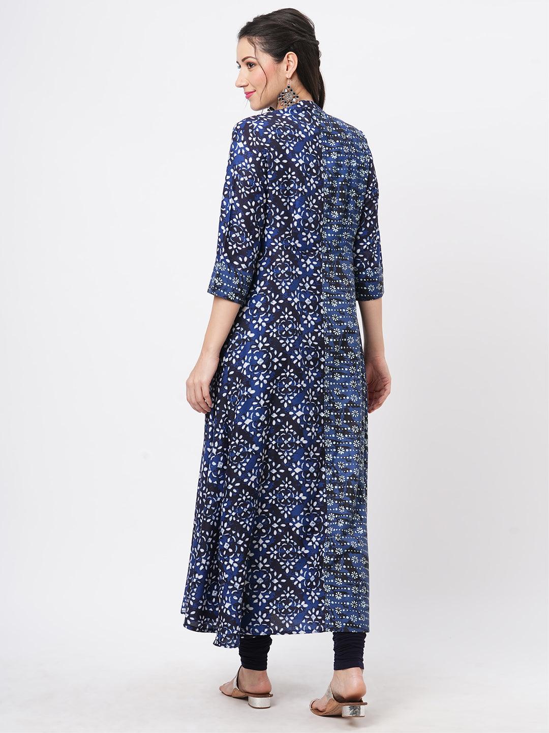 Hashtag Be Indigo two print long flared kurta complimenting each other with contrast color tassel at the neck.