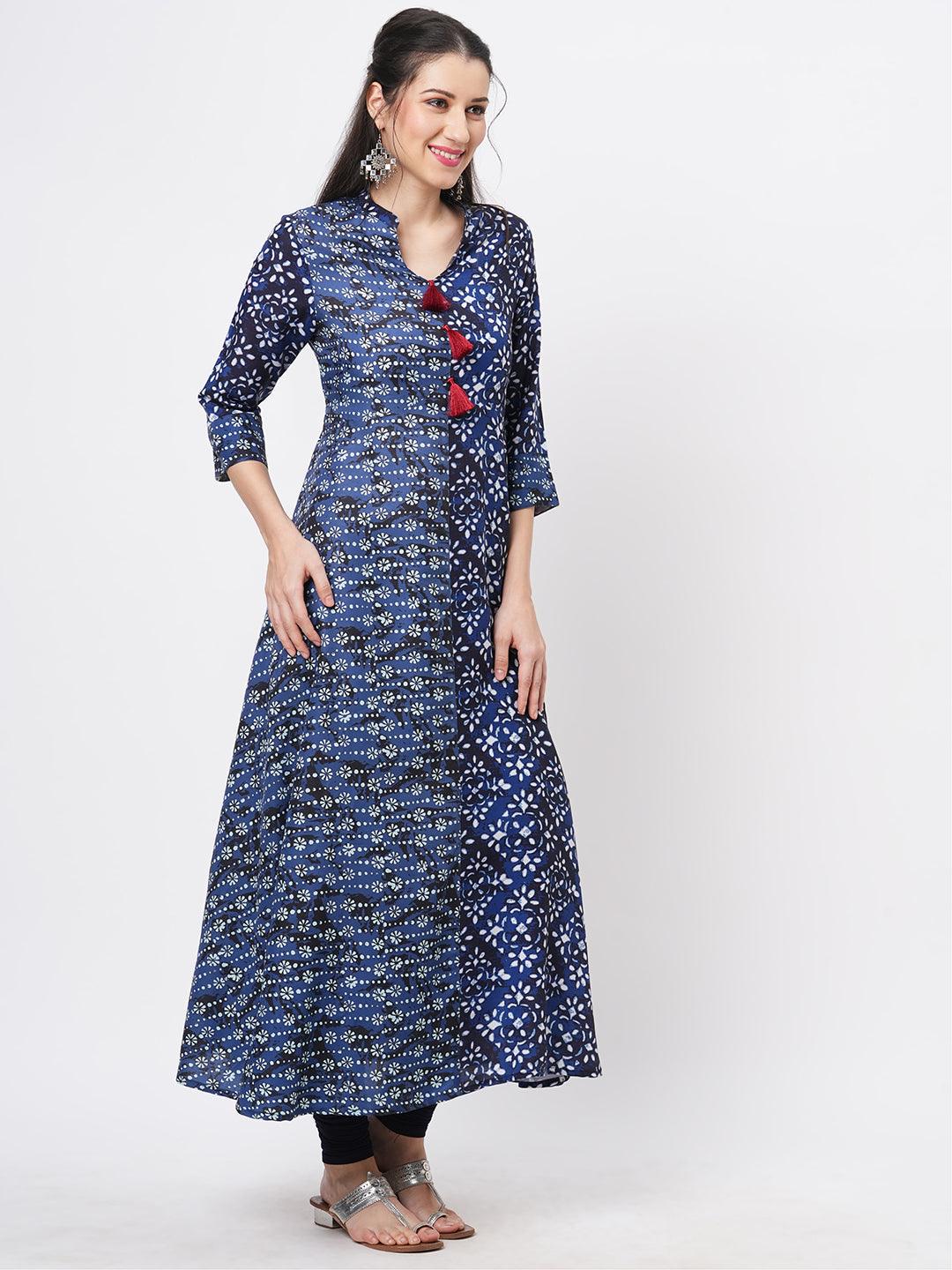Hashtag Be Indigo two print long flared kurta complimenting each other with contrast color tassel at the neck.