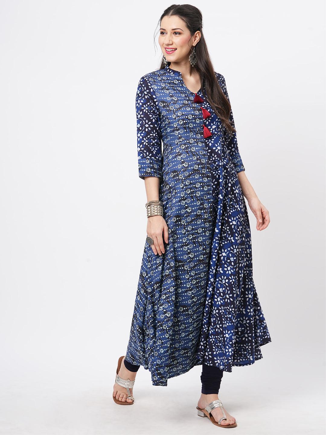 Hashtag Be Indigo two print long flared kurta complimenting each other with contrast color tassel at the neck.