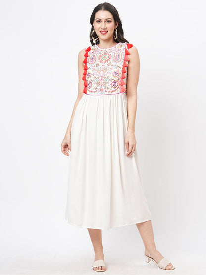 Hashtag Be Featuring a Offwhite boho calf length airy dress with tassel and embroidery