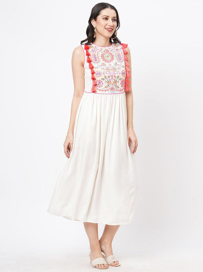 Hashtag Be Featuring a Offwhite boho calf length airy dress with tassel and embroidery