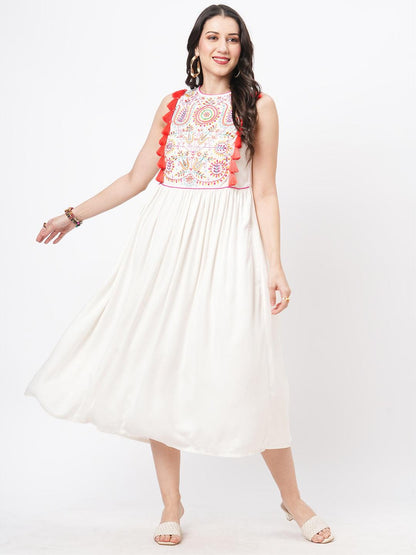 Hashtag Be Featuring a Offwhite boho calf length airy dress with tassel and embroidery